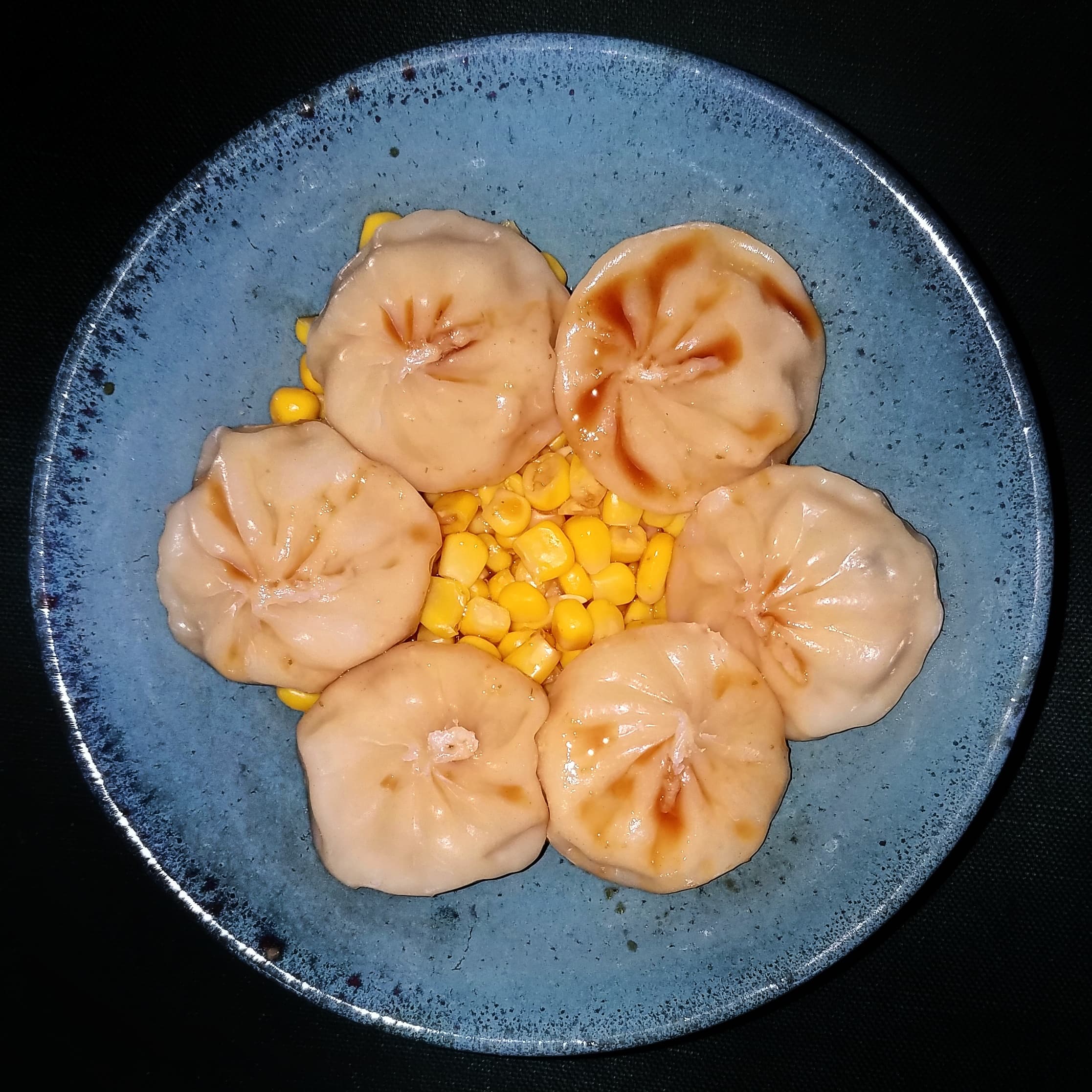 Illustrative photograph of dumplings, not this fictional restaurant